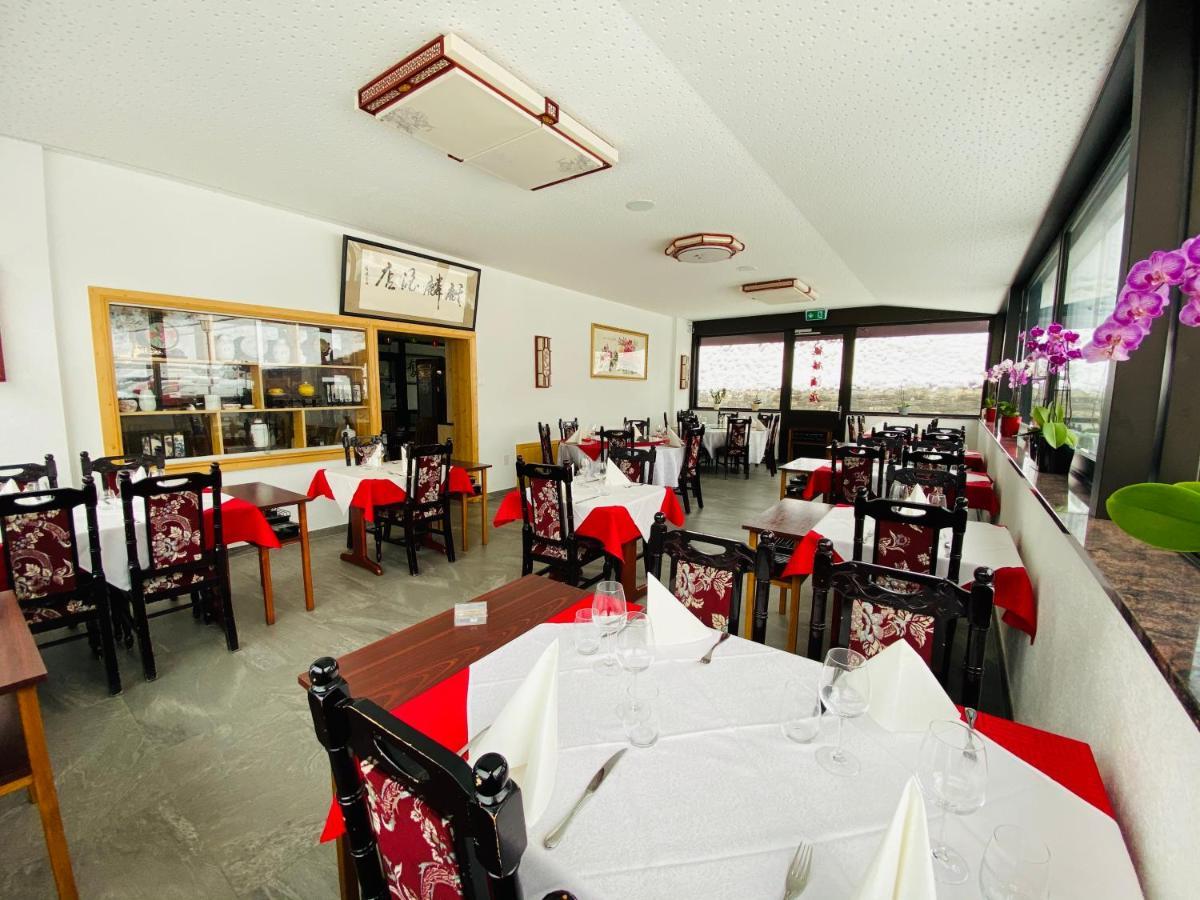 Qi-Lin Hotel Restaurant Ayer Buitenkant foto